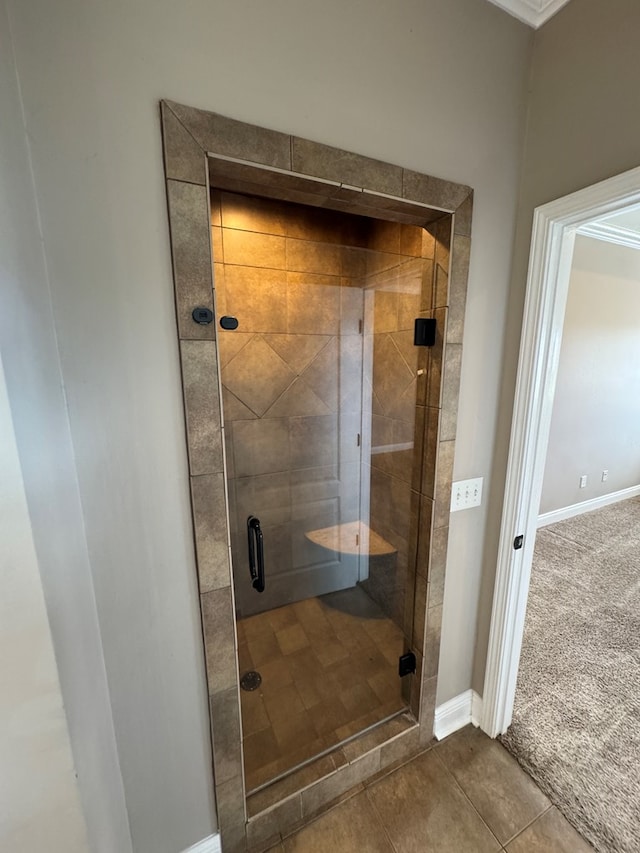 2103 Holland Rd, Newton, AL 36352 - bathroom featuring a shower stall, baseboards, and tile patterned flooring