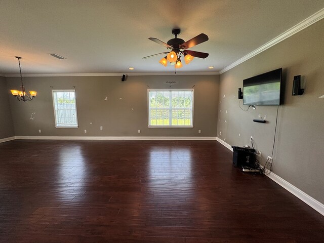 2103 Holland Rd, Newton, AL 36352 - unfurnished living room featuring dark wood-style floors, a ceiling fan, a chandelier, crown molding, and baseboards