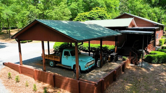 view of parking / parking lot with a carport