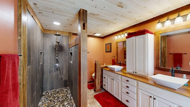 bathroom with wooden ceiling, toilet, a shower, vanity, and crown molding