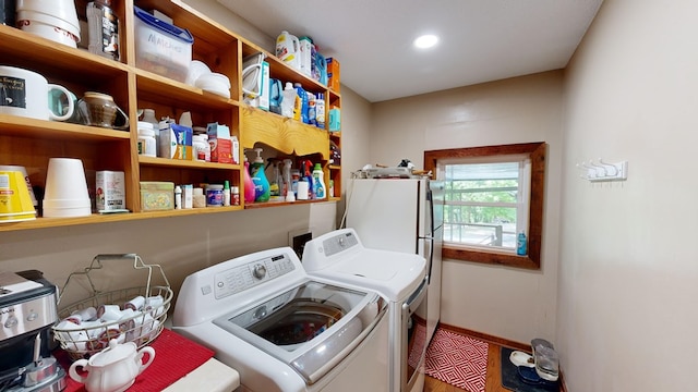 clothes washing area featuring laundry area, recessed lighting, baseboards, and independent washer and dryer