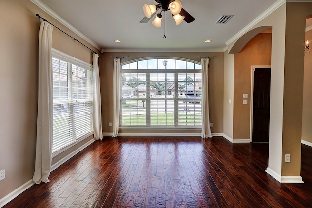 223 Veritas Dr, Dothan, AL 36303 - unfurnished room featuring arched walkways, hardwood / wood-style flooring, a ceiling fan, and crown molding