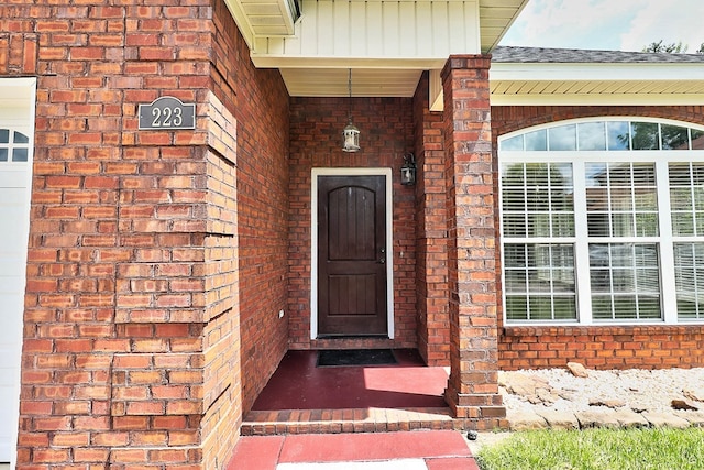223 Veritas Dr, Dothan, AL 36303 - doorway to property featuring brick siding