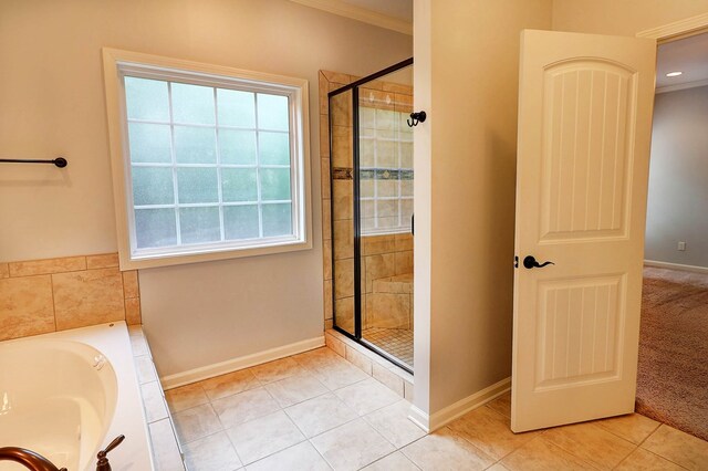 223 Veritas Dr, Dothan, AL 36303 - full bath featuring a stall shower, a garden tub, tile patterned floors, and crown molding