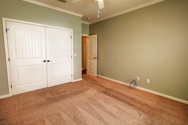 223 Veritas Dr, Dothan, AL 36303 - unfurnished bedroom with carpet, crown molding, a closet, and ceiling fan