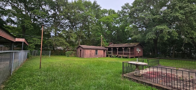 1594 Denton Rd, Dothan, AL 36303 - fenced backyard with an outbuilding