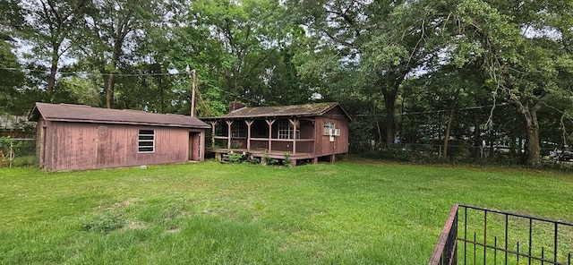 1594 Denton Rd, Dothan, AL 36303 - fenced backyard featuring an outbuilding