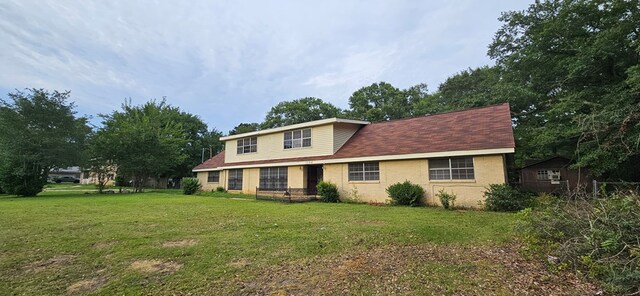 1594 Denton Rd, Dothan, AL 36303 - traditional home featuring a front yard and brick siding