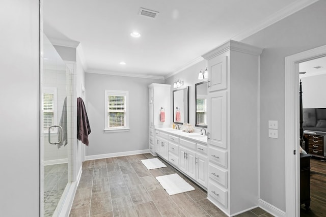 606 Billings Trl, Dothan, AL 36305 - full bathroom featuring double vanity, crown molding, a stall shower, baseboards, and recessed lighting