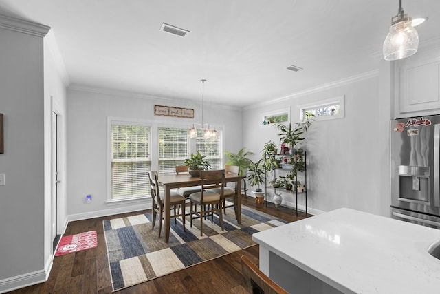 606 Billings Trl, Dothan, AL 36305 - dining room with plenty of natural light, baseboards, dark wood-type flooring, and crown molding