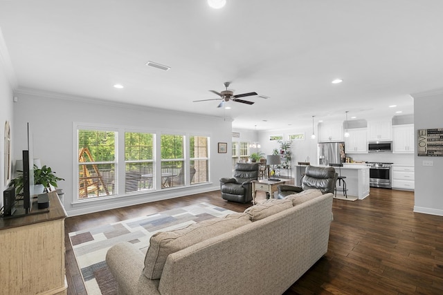 606 Billings Trl, Dothan, AL 36305 - living room featuring ceiling fan, recessed lighting, dark wood-type flooring, crown molding, and baseboards