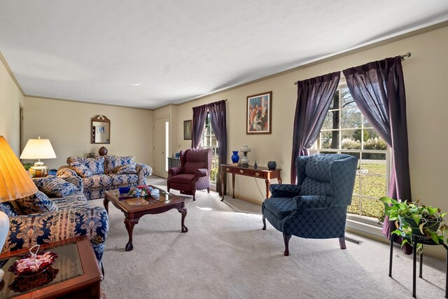 living room featuring light colored carpet and ornamental molding