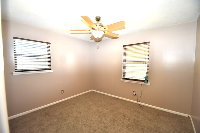 unfurnished room featuring carpet floors and ceiling fan