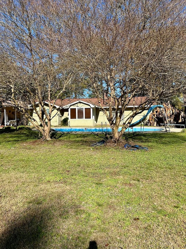 view of yard featuring a playground