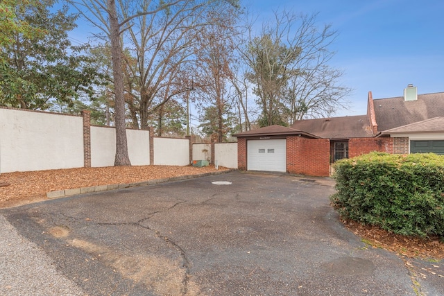 exterior space featuring a garage