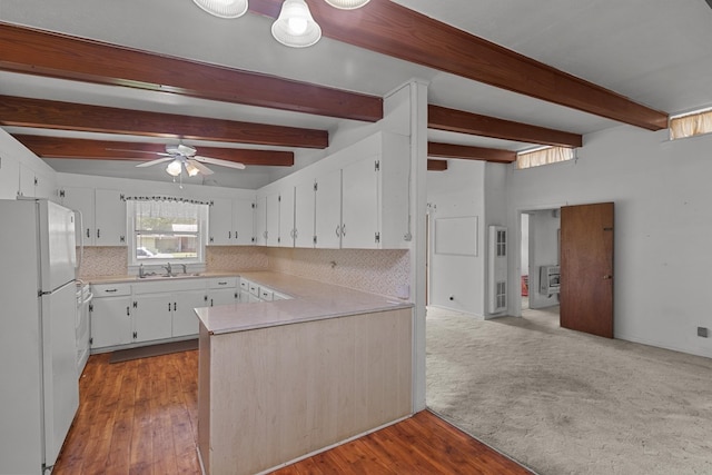 1104 Valley Forge Rd, Dothan, AL 36301 - kitchen featuring freestanding refrigerator, a peninsula, ceiling fan, decorative backsplash, and light countertops