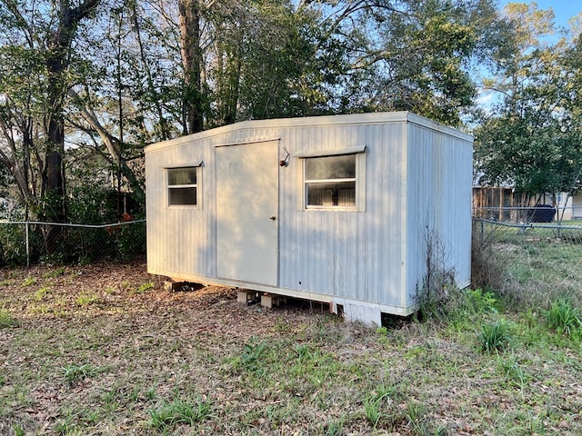 view of shed featuring a fenced backyard