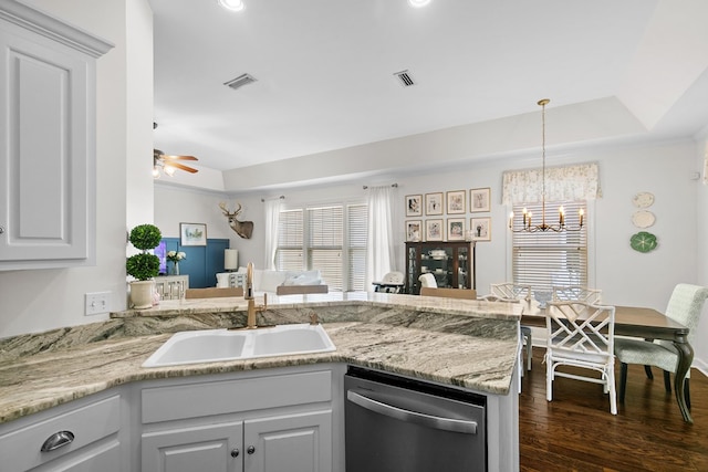 538 Orchard, Dothan, AL 36305 - kitchen featuring stainless steel dishwasher, a ceiling fan, a chandelier, dark wood-style flooring, and hanging light fixtures
