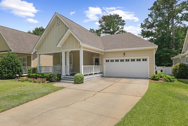 538 Orchard, Dothan, AL 36305 - craftsman house with board and batten siding, a shingled roof, concrete driveway, a garage, and a front lawn