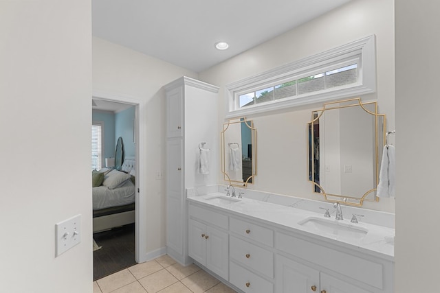 538 Orchard, Dothan, AL 36305 - ensuite bathroom with double vanity and tile patterned flooring
