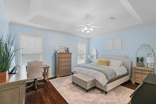 538 Orchard, Dothan, AL 36305 - bedroom featuring a raised ceiling, dark wood-type flooring, a desk, crown molding, and ceiling fan