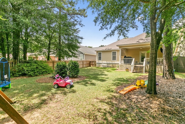 538 Orchard, Dothan, AL 36305 - fenced backyard featuring a trampoline