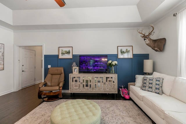 538 Orchard, Dothan, AL 36305 - living room with wood finished floors, a wainscoted wall, ceiling fan, and a tray ceiling