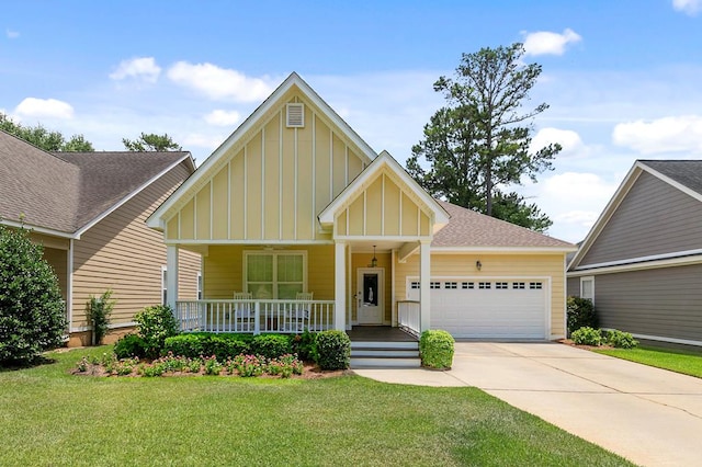 538 Orchard, Dothan, AL 36305 - craftsman-style house with board and batten siding, covered porch, an attached garage, a front lawn, and concrete driveway