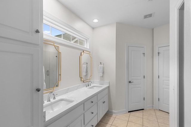 538 Orchard, Dothan, AL 36305 - full bath with double vanity, a stall shower, and tile patterned flooring