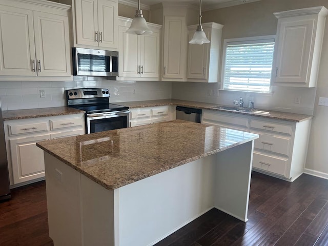 101 Brattleboro Ct, Dothan, AL 36301 - kitchen featuring stainless steel appliances, dark wood finished floors, white cabinets, decorative backsplash, and light stone countertops