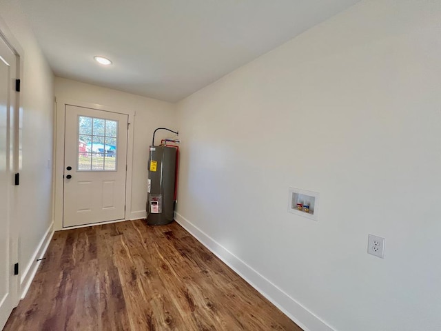 entryway with electric water heater and dark wood-type flooring