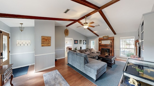 living room with lofted ceiling with beams, ceiling fan, and dark hardwood / wood-style flooring