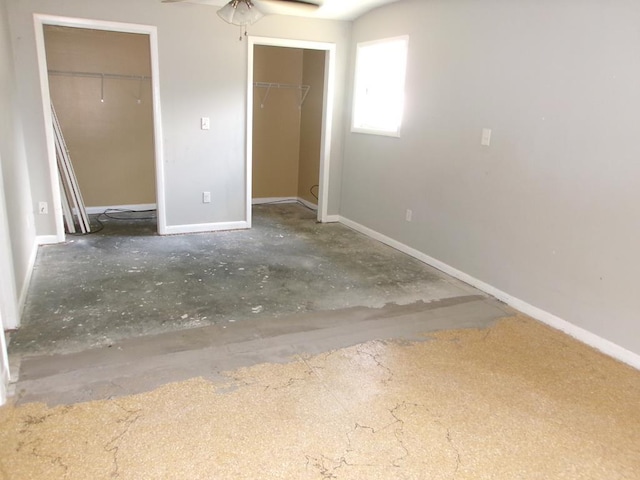 202 Cardinal Ln, Enterprise, AL 36330 - unfurnished bedroom with two closets and baseboards