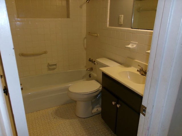202 Cardinal Ln, Enterprise, AL 36330 - full bath with tile walls, washtub / shower combination, tile patterned floors, and vanity