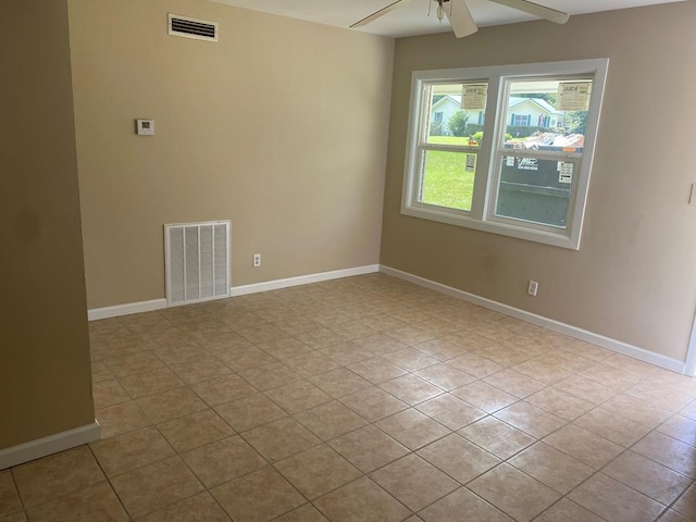 empty room featuring ceiling fan