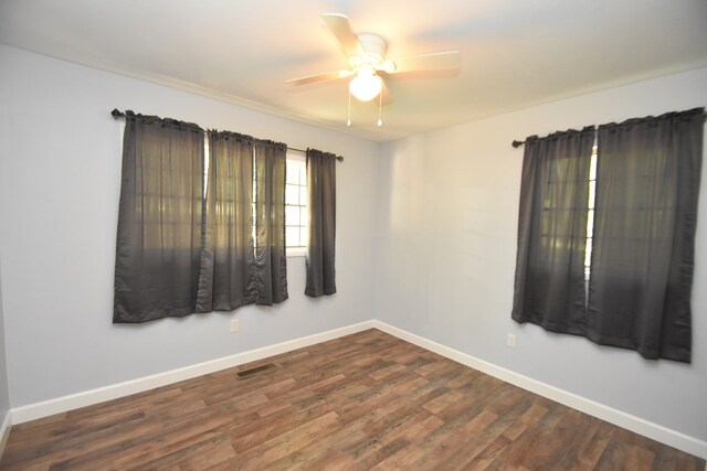 145 Deerpath St, Ozark, AL 36360 - unfurnished room with ceiling fan and dark wood-style floors