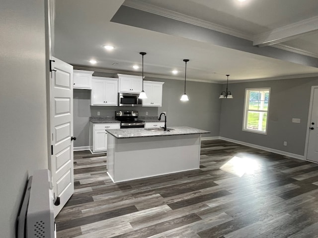 kitchen with baseboards, ornamental molding, a sink, and appliances with stainless steel finishes