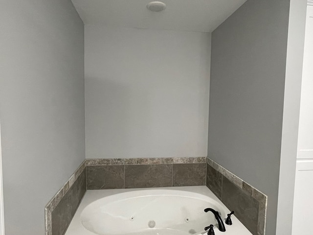 bathroom featuring a whirlpool tub