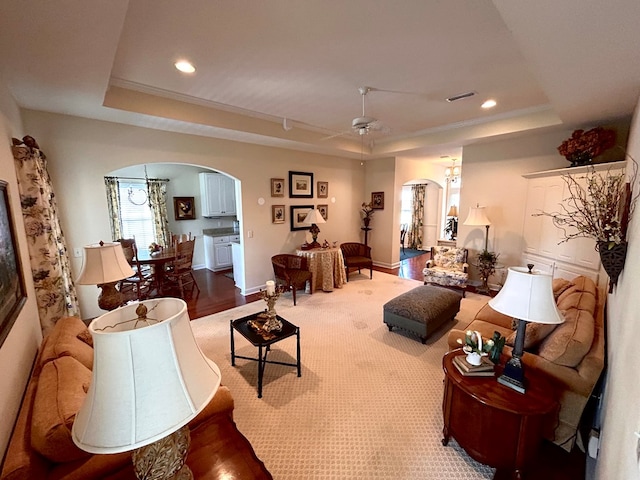 210 Petersburg Ct, Dothan, AL 36301 - living room featuring visible vents, a ceiling fan, recessed lighting, a tray ceiling, and arched walkways