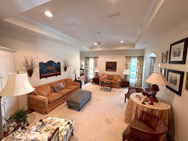 210 Petersburg Ct, Dothan, AL 36301 - living room with a ceiling fan, arched walkways, carpet floors, a tray ceiling, and recessed lighting