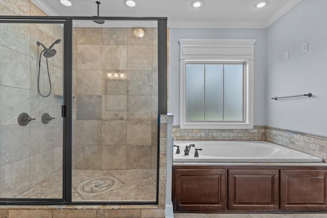 125 Hayley Dr, Enterprise, AL 36330 - bathroom with a bath, ornamental molding, a stall shower, and recessed lighting