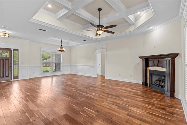 125 Hayley Dr, Enterprise, AL 36330 - unfurnished living room with coffered ceiling, wood finished floors, ceiling fan, ornamental molding, and a chandelier