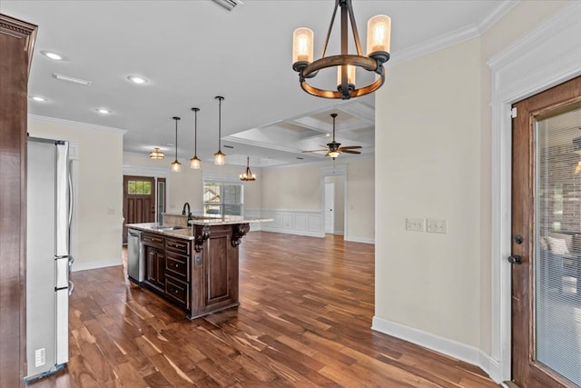 125 Hayley Dr, Enterprise, AL 36330 - kitchen with appliances with stainless steel finishes, a chandelier, crown molding, dark wood-style flooring, and dark brown cabinetry