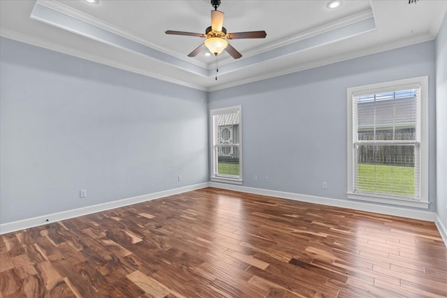 125 Hayley Dr, Enterprise, AL 36330 - empty room featuring a tray ceiling, ornamental molding, wood finished floors, a ceiling fan, and recessed lighting