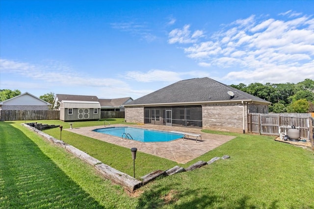 125 Hayley Dr, Enterprise, AL 36330 - view of swimming pool with a sunroom, a fenced backyard, a shed, and a patio