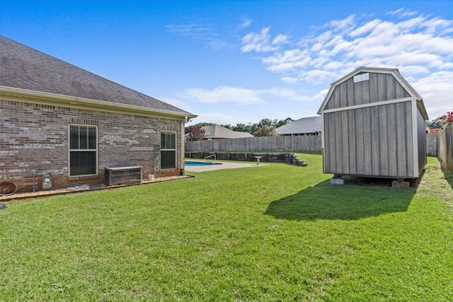 125 Hayley Dr, Enterprise, AL 36330 - fenced backyard with a storage shed
