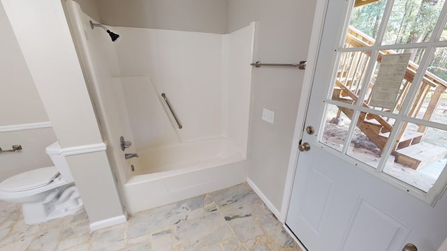 2235 Enterprise Rd, Geneva, AL 36340 - bathroom featuring toilet and tub / shower combination