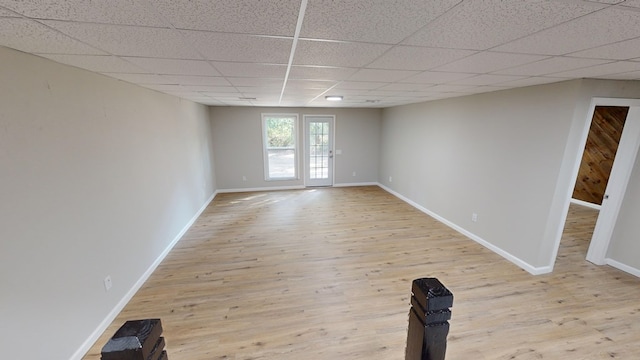 2235 Enterprise Rd, Geneva, AL 36340 - empty room featuring a paneled ceiling and light wood-type flooring