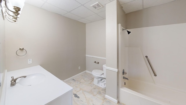2235 Enterprise Rd, Geneva, AL 36340 - full bathroom featuring a paneled ceiling, shower / bathtub combination, toilet, and sink