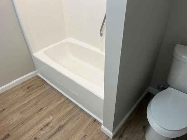 2235 Enterprise Rd, Geneva, AL 36340 - bathroom with wood-type flooring and toilet